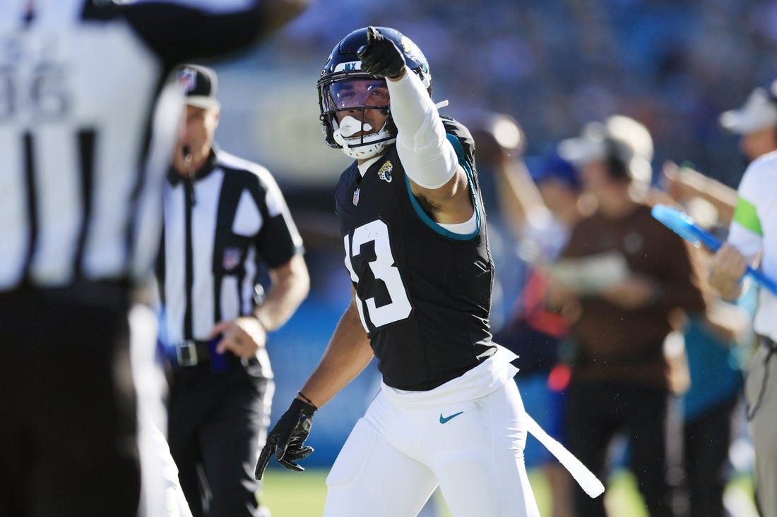 Jacksonville Jaguars wide receiver Christian Kirk (13) signals a first down during the third quarter an NFL football matchup Sunday, Nov. 19, 2023 at EverBank Stadium in Jacksonville, Fla. The Jacksonville Jaguars defeated the Tennessee Titans 34-14. [Corey Perrine/Florida Times-Union]