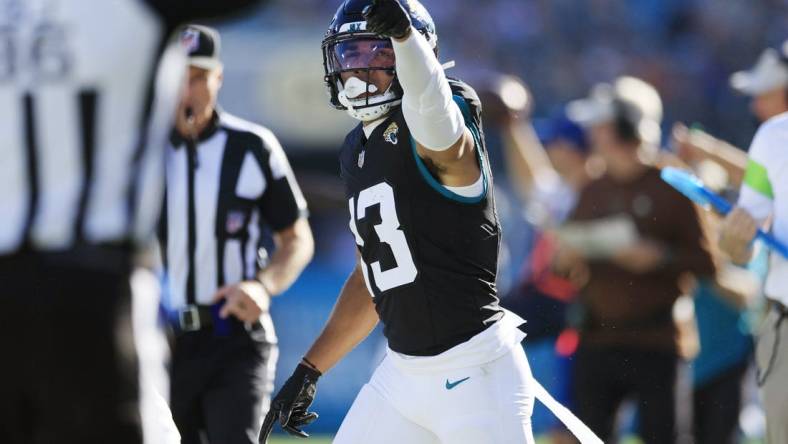 Jacksonville Jaguars wide receiver Christian Kirk (13) signals a first down during the third quarter an NFL football matchup Sunday, Nov. 19, 2023 at EverBank Stadium in Jacksonville, Fla. The Jacksonville Jaguars defeated the Tennessee Titans 34-14. [Corey Perrine/Florida Times-Union]