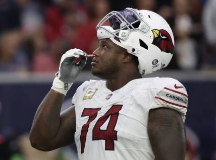 Nov 19, 2023; Houston, Texas, USA; Arizona Cardinals offensive tackle D.J. Humphries (74) smells smelling salts as he and the Houston Texans waits for a call in the second half at NRG Stadium. Mandatory Credit: Thomas Shea-USA TODAY Sports