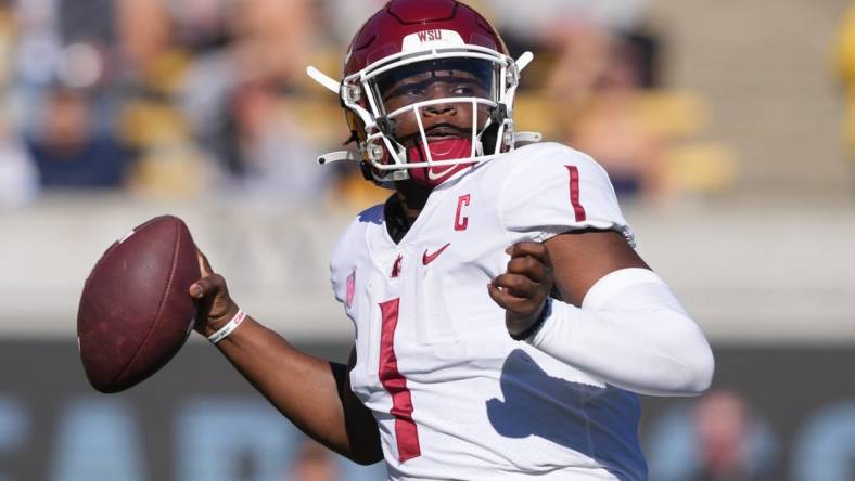 Nov 11, 2023; Berkeley, California, USA; Washington State Cougars quarterback Cameron Ward (1) passes against the California Golden Bears during the first quarter at California Memorial Stadium. Mandatory Credit: Darren Yamashita-USA TODAY Sports