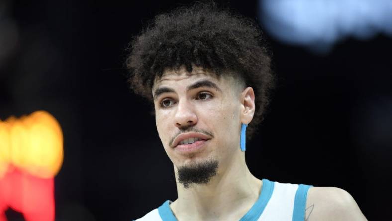 Nov 22, 2023; Charlotte, North Carolina, USA; Charlotte Hornets guard LaMelo Ball (1) looks on during a time out in the second half against the Washington Wizards at the Spectrum Center. Mandatory Credit: Sam Sharpe-USA TODAY Sports