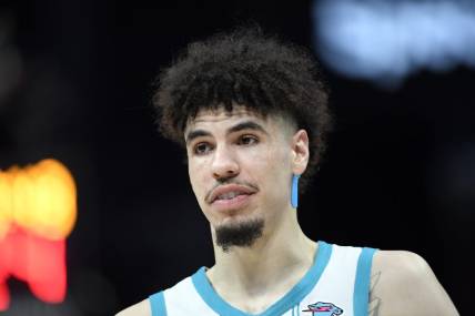 Nov 22, 2023; Charlotte, North Carolina, USA; Charlotte Hornets guard LaMelo Ball (1) looks on during a time out in the second half against the Washington Wizards at the Spectrum Center. Mandatory Credit: Sam Sharpe-USA TODAY Sports
