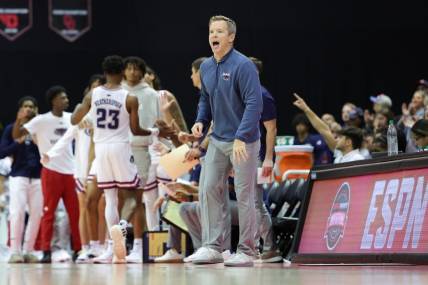 Nov 24, 2023; Kissimmee, FL, USA;  Florida Atlantic Owls head coach Dusty May calls to his team against the Texas A&M Aggies in the second half during the ESPN Events Invitational Semifinals at State Farm Field House. Mandatory Credit: Nathan Ray Seebeck-USA TODAY Sports