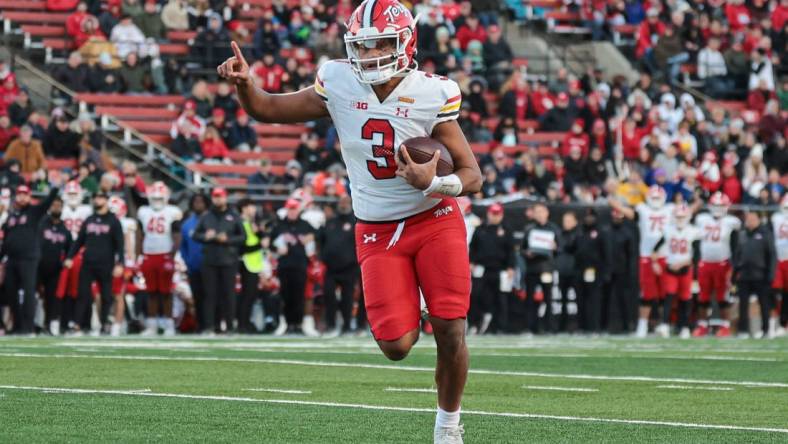 Nov 25, 2023; Piscataway, New Jersey, USA; Maryland Terrapins quarterback Taulia Tagovailoa (3) scores a rushing touchdown during the first half against the Rutgers Scarlet Knights at SHI Stadium. Mandatory Credit: Vincent Carchietta-USA TODAY Sports