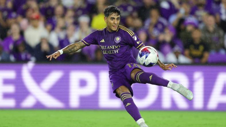 Nov 25, 2023; Orlando, Florida, USA; Orlando City forward Facundo Torres (17) shoots the ball against Columbus Crew during the first half in a MLS Cup Eastern Conference Semifinal match at Exploria Stadium. Mandatory Credit: Nathan Ray Seebeck-USA TODAY Sports