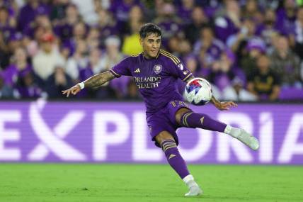Nov 25, 2023; Orlando, Florida, USA; Orlando City forward Facundo Torres (17) shoots the ball against Columbus Crew during the first half in a MLS Cup Eastern Conference Semifinal match at Exploria Stadium. Mandatory Credit: Nathan Ray Seebeck-USA TODAY Sports