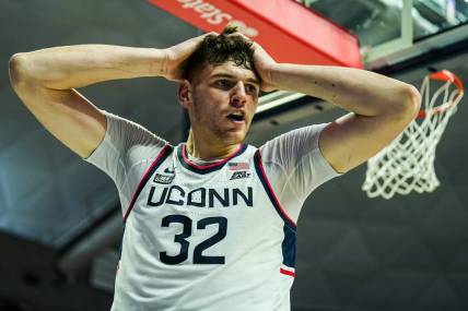 Nov 27, 2023; Storrs, Connecticut, USA; UConn Huskies center Donovan Clingan (32) reacts after being fouled by New Hampshire Wildcats in the second half at Harry A. Gampel Pavilion. Mandatory Credit: David Butler II-USA TODAY Sports