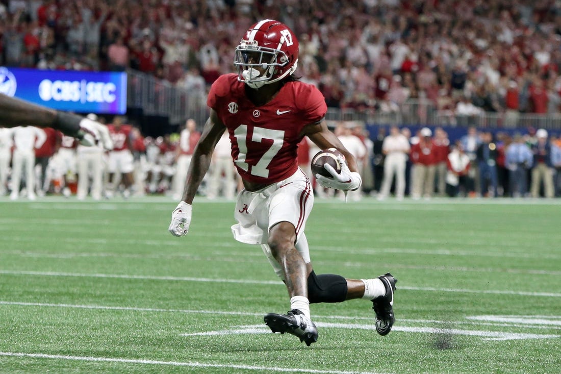 Dec 2, 2023; Atlanta, GA, USA; Alabama Crimson Tide wide receiver Isaiah Bond (17) runs for a touchdown against the Georgia Bulldogs in the fourth quarter at Mercedes-Benz Stadium. Mandatory Credit: Brett Davis-USA TODAY Sports