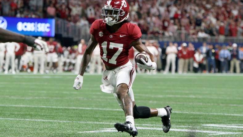 Dec 2, 2023; Atlanta, GA, USA; Alabama Crimson Tide wide receiver Isaiah Bond (17) runs for a touchdown against the Georgia Bulldogs in the fourth quarter at Mercedes-Benz Stadium. Mandatory Credit: Brett Davis-USA TODAY Sports