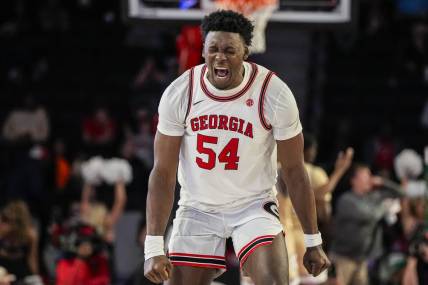 Dec 5, 2023; Athens, Georgia, USA; Georgia Bulldogs center Russel Tchewa (54) reacts after a Georgia basket against the Georgia Tech Yellow Jackets during the second half at Stegeman Coliseum. Mandatory Credit: Dale Zanine-USA TODAY Sports