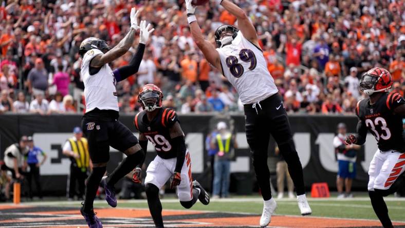 Baltimore Ravens tight end Mark Andrews (89) collects a pass in the end zone as Cincinnati Bengals cornerback Cam Taylor-Britt (29) defends in the second quarter of a Week 2 NFL football game between the Baltimore Ravens and the Cincinnati Bengals Sunday, Sept. 17, 2023, at Paycor Stadium in Cincinnati.