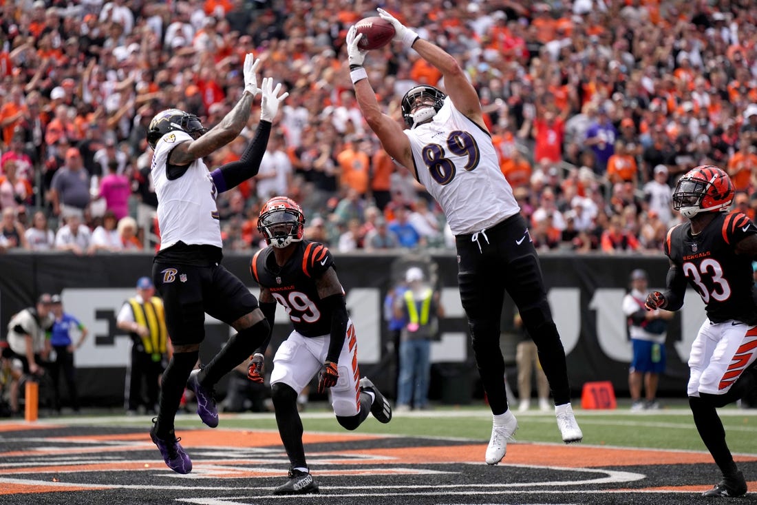 Baltimore Ravens tight end Mark Andrews (89) collects a pass in the end zone as Cincinnati Bengals cornerback Cam Taylor-Britt (29) defends in the second quarter of a Week 2 NFL football game between the Baltimore Ravens and the Cincinnati Bengals Sunday, Sept. 17, 2023, at Paycor Stadium in Cincinnati.