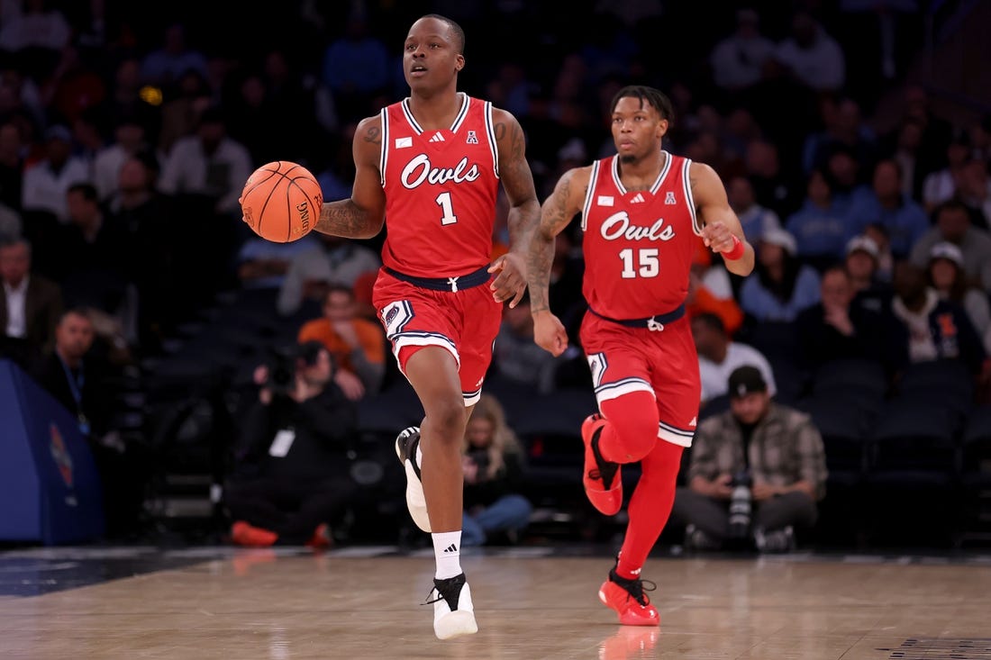 Dec 5, 2023; New York, New York, USA; Florida Atlantic Owls guard Johnell Davis (1) brings the ball up court against the Illinois Fighting Illini with guard Alijah Martin (15) during the second half at Madison Square Garden. Mandatory Credit: Brad Penner-USA TODAY Sports