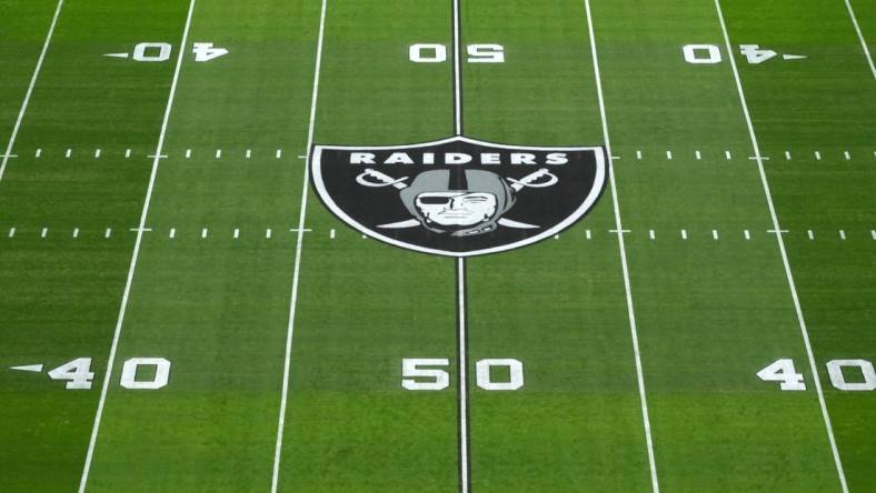 Dec 10, 2023; Paradise, Nevada, USA; The Las Vegas Raiders shield logo at midfield at Allegiant Stadium. Mandatory Credit: Kirby Lee-USA TODAY Sports