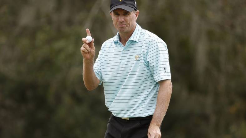 Dec 10, 2023; Bradenton, Florida, USA; Team International s Steven Alker reacts to an eagle putt on the eighth hole during their afternoon round at The Concession Golf Club. Mandatory Credit: Jeff Swinger-USA TODAY Sports