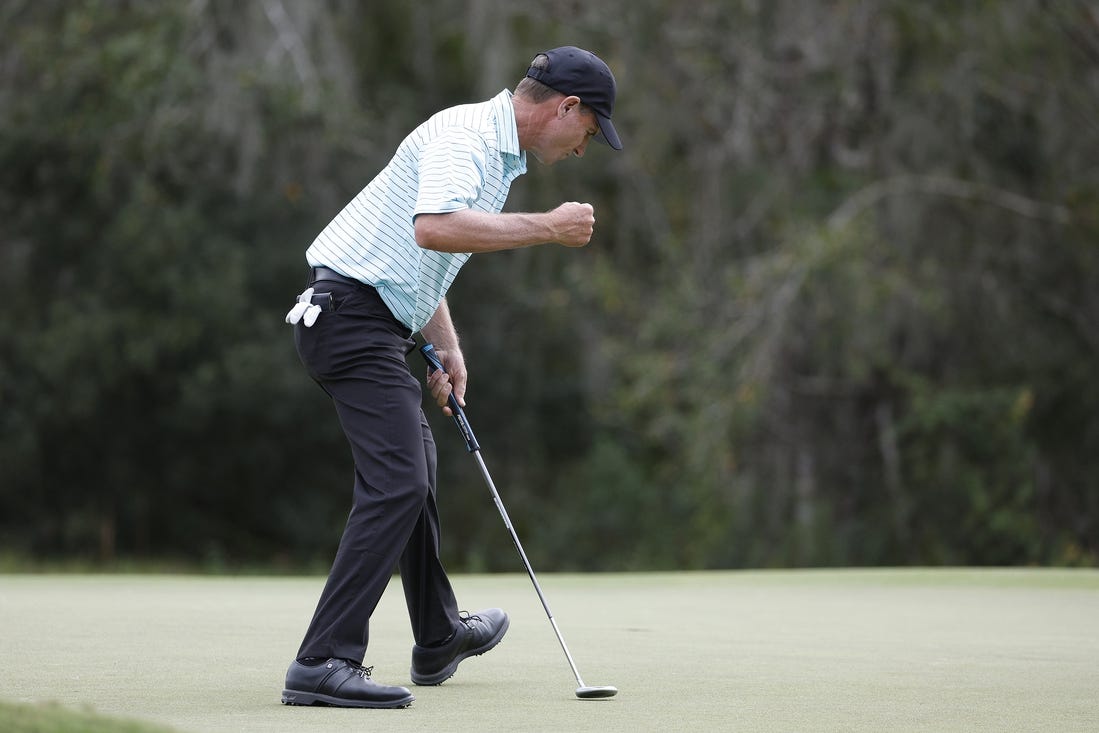 Dec 10, 2023; Bradenton, Florida, USA; Team International s Steven Alker reacts to an eagle putt on the eighth hole during their afternoon round at The Concession Golf Club. Mandatory Credit: Jeff Swinger-USA TODAY Sports