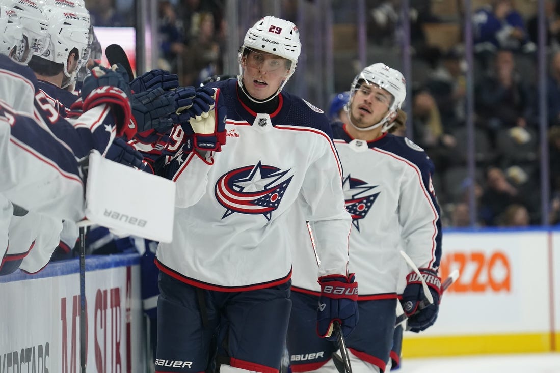 Dec 14, 2023; Toronto, Ontario, CAN; Columbus Blue Jackets forward Patrik Laine (29) gets congratulated after scoring against the Toronto Maple Leafs during the first period at Scotiabank Arena. Mandatory Credit: John E. Sokolowski-USA TODAY Sports