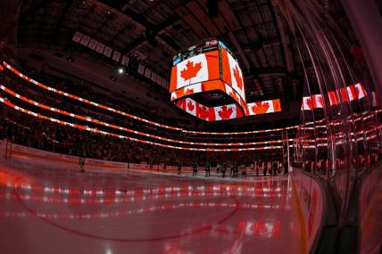 Dec 15, 2023; Dallas, Texas, USA; A view of the Canadian flag during the playing of the national anthem of Canada before the game between the Dallas Stars and the Ottawa Senators at the American Airlines Center. Mandatory Credit: Jerome Miron-USA TODAY Sports