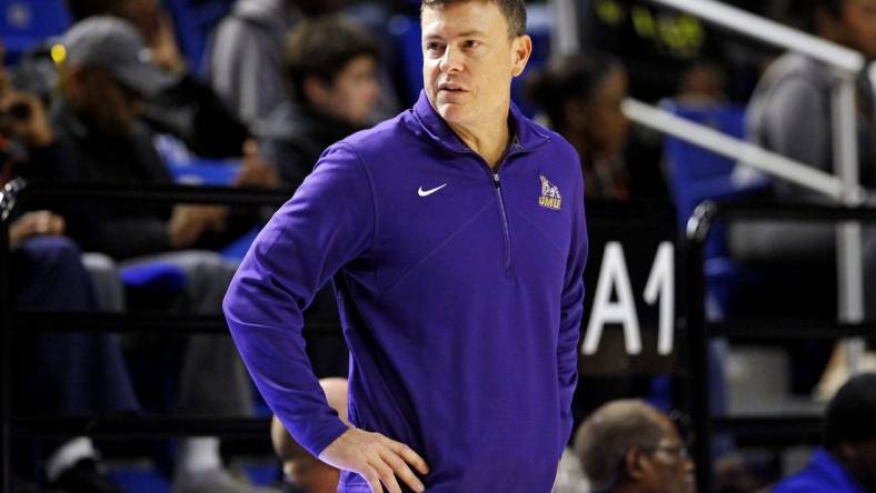 Dec 16, 2023; Hampton, Virginia, USA; James Madison Dukes head coach Mark Byington looks on during the second half of the game against the Hampton Pirates at Hampton Convocation Center. Mandatory Credit: Peter Casey-USA TODAY Sports