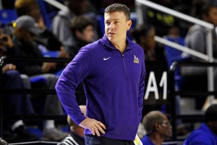 Dec 16, 2023; Hampton, Virginia, USA; James Madison Dukes head coach Mark Byington looks on during the second half of the game against the Hampton Pirates at Hampton Convocation Center. Mandatory Credit: Peter Casey-USA TODAY Sports
