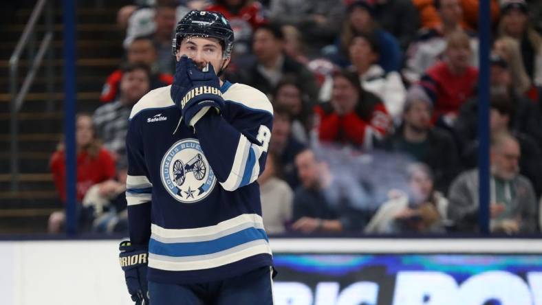 Dec 16, 2023; Columbus, Ohio, USA; Columbus Blue Jackets defenseman Zach Werenski (8) reacts to a missed shot during the first period against the New Jersey Devils at Nationwide Arena. Mandatory Credit: Joseph Maiorana-USA TODAY Sports