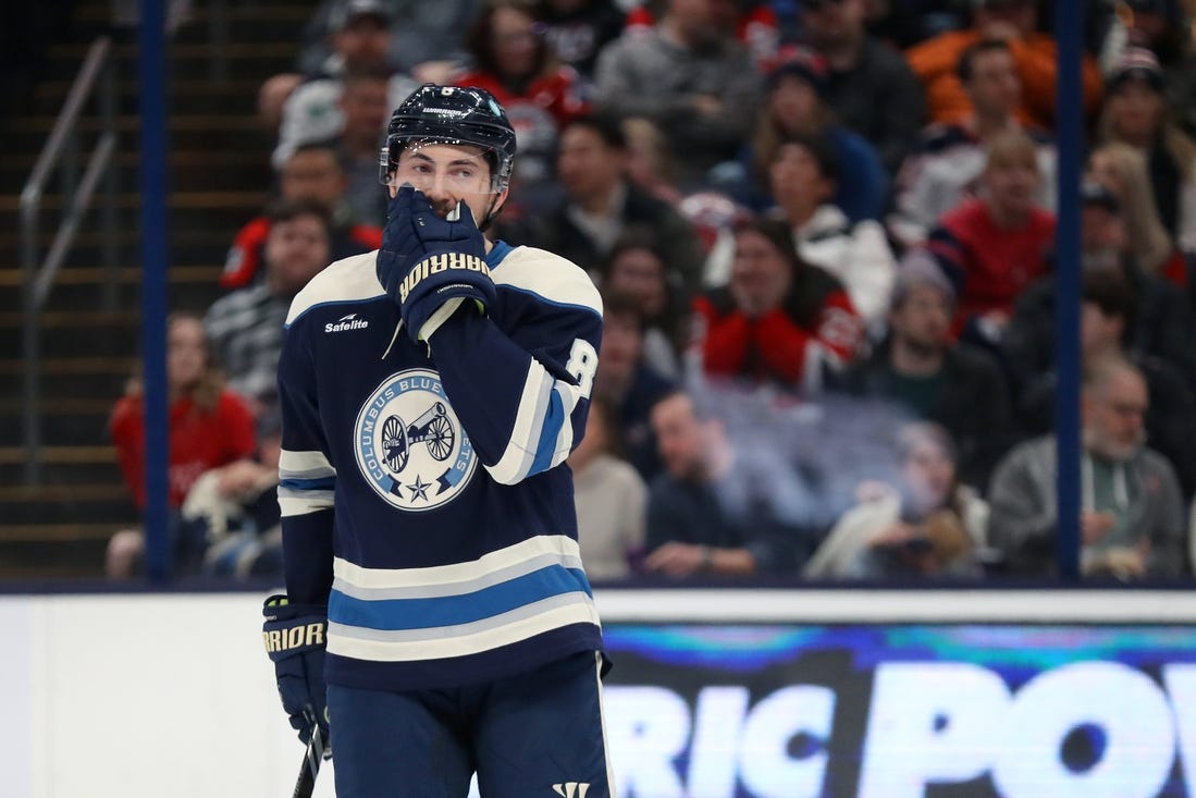 Dec 16, 2023; Columbus, Ohio, USA; Columbus Blue Jackets defenseman Zach Werenski (8) reacts to a missed shot during the first period against the New Jersey Devils at Nationwide Arena. Mandatory Credit: Joseph Maiorana-USA TODAY Sports