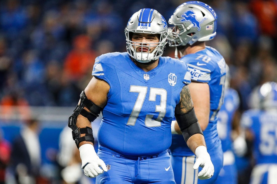 Detroit Lions guard Jonah Jackson warms up before the Denver Broncos game at Ford Field in Detroit on Saturday, Dec. 16, 2023.