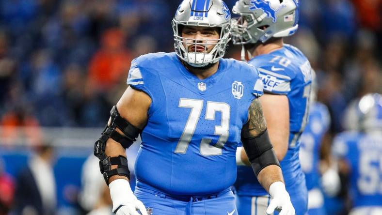 Detroit Lions guard Jonah Jackson warms up before the Denver Broncos game at Ford Field in Detroit on Saturday, Dec. 16, 2023.