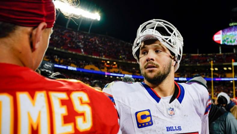 Dec 10, 2023; Kansas City, Missouri, USA; Buffalo Bills quarterback Josh Allen (17) talks with Kansas City Chiefs quarterback Patrick Mahomes (15) after a game  at GEHA Field at Arrowhead Stadium. Mandatory Credit: Jay Biggerstaff-USA TODAY Sports