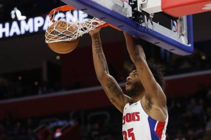 Dec 21, 2023; Detroit, Michigan, USA;  Detroit Pistons forward Marvin Bagley III (35) dunks in the first half against the Utah Jazz at Little Caesars Arena. Mandatory Credit: Rick Osentoski-USA TODAY Sports