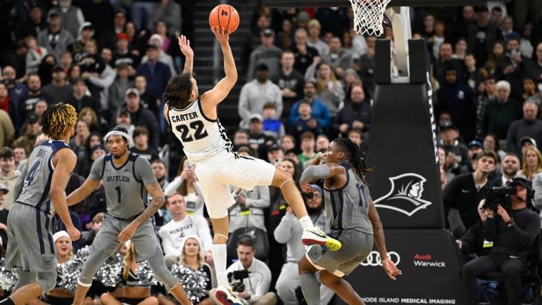 Dec 23, 2023; Providence, Rhode Island, USA; Providence Friars guard Devin Carter (22) shoots the ball against the Butler Bulldogs during overtime at Amica Mutual Pavilion. Mandatory Credit: Eric Canha-USA TODAY Sports