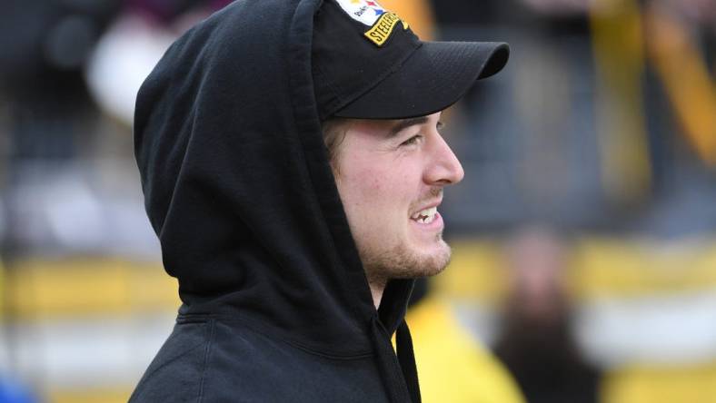 Dec 23, 2023; Pittsburgh, Pennsylvania, USA;  Pittsburgh Steelers quarterback Kenny Pickett (8) watches from the sidelines before a game against the Cincinnati Bengals at Acrisure Stadium. Mandatory Credit: Philip G. Pavely-USA TODAY Sports