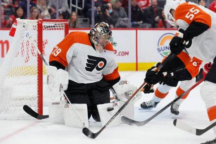 Dec 22, 2023; Detroit, Michigan, USA;  Philadelphia Flyers goaltender Carter Hart (79) makes a save in the second period against the Detroit Red Wings at Little Caesars Arena. Mandatory Credit: Rick Osentoski-USA TODAY Sports