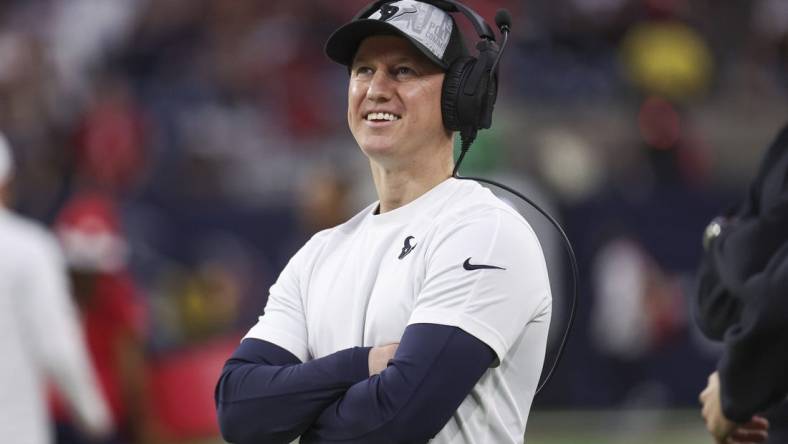 Dec 24, 2023; Houston, Texas, USA; Houston Texans offensive coordinator Bobby Slowik smiles before the game against the Cleveland Browns at NRG Stadium. Mandatory Credit: Troy Taormina-USA TODAY Sports