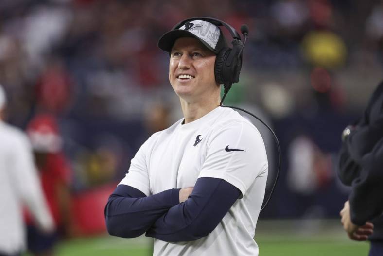 Dec 24, 2023; Houston, Texas, USA; Houston Texans offensive coordinator Bobby Slowik smiles before the game against the Cleveland Browns at NRG Stadium. Mandatory Credit: Troy Taormina-USA TODAY Sports