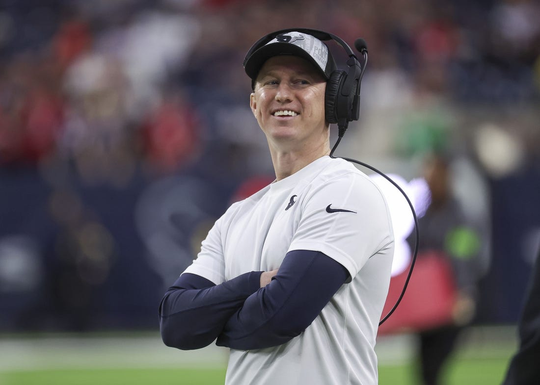 Dec 24, 2023; Houston, Texas, USA; Houston Texans offensive coordinator Bobby Slowik smiles before the game against the Cleveland Browns at NRG Stadium. Mandatory Credit: Troy Taormina-USA TODAY Sports