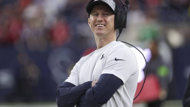 Dec 24, 2023; Houston, Texas, USA; Houston Texans offensive coordinator Bobby Slowik smiles before the game against the Cleveland Browns at NRG Stadium. Mandatory Credit: Troy Taormina-USA TODAY Sports