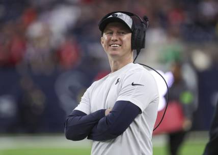 Dec 24, 2023; Houston, Texas, USA; Houston Texans offensive coordinator Bobby Slowik smiles before the game against the Cleveland Browns at NRG Stadium. Mandatory Credit: Troy Taormina-USA TODAY Sports