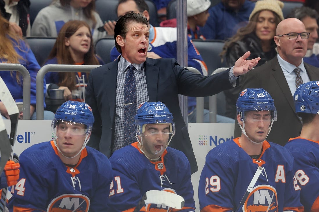 Dec 27, 2023; Elmont, New York, USA; New York Islanders head coach Lane Lambert reacts as he coaches against the Pittsburgh Penguins during the first period at UBS Arena. Mandatory Credit: Brad Penner-USA TODAY Sports