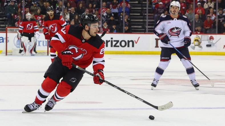 Dec 27, 2023; Newark, New Jersey, USA; New Jersey Devils right wing Timo Meier (28) skates with the puck against the Columbus Blue Jackets during the second period at Prudential Center. Mandatory Credit: Ed Mulholland-USA TODAY Sports