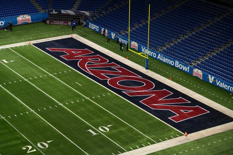 Dec 28, 2023; San Antonio, TX, USA; The Arizona Wildcats logo in the end zone at Alamodome. Mandatory Credit: Kirby Lee-USA TODAY Sports