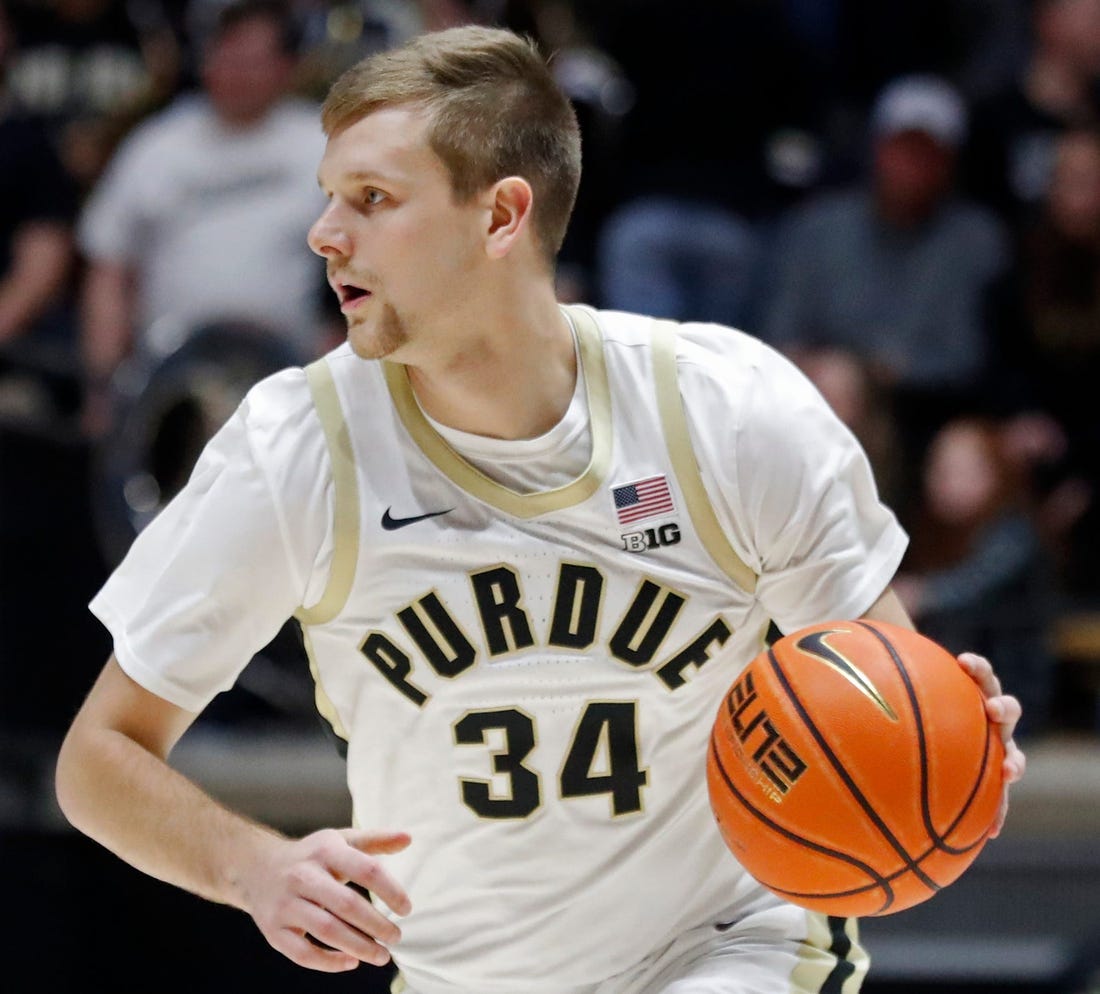 Purdue Boilermakers guard Carson Barrett (34) drives to the basket during the NCAA men   s basketball game against the Eastern Kentucky Colonels, Friday, Dec. 29, 2023, at Mackey Arena in West Lafayette, Ind. Purdue Boilermakers won 80-53.