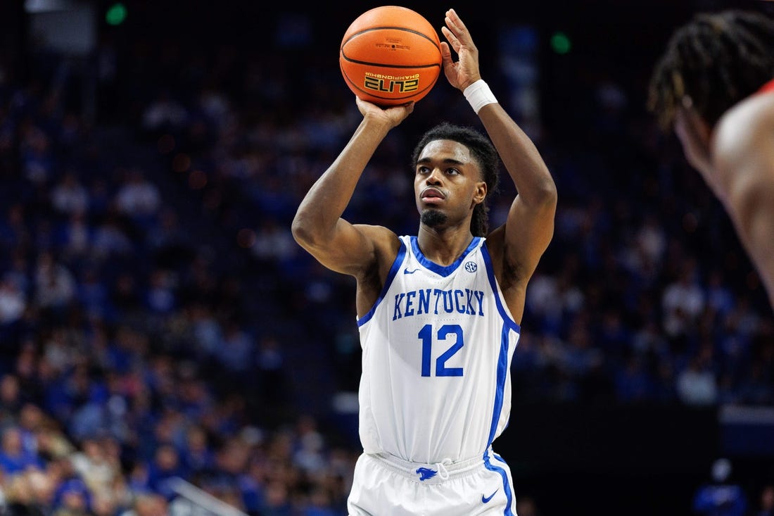 Dec 29, 2023; Lexington, Kentucky, USA; Kentucky Wildcats guard Antonio Reeves (12) shoots a free throw during the second half against the Illinois State Redbirds at Rupp Arena at Central Bank Center. Mandatory Credit: Jordan Prather-USA TODAY Sports