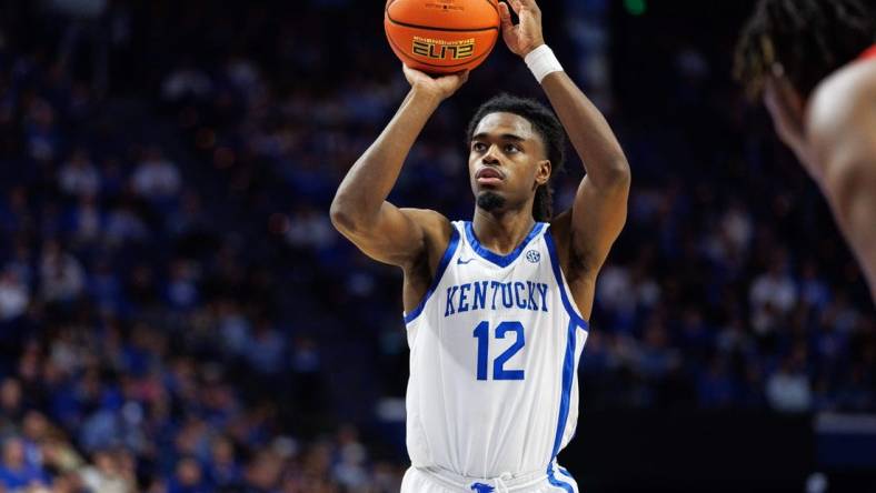 Dec 29, 2023; Lexington, Kentucky, USA; Kentucky Wildcats guard Antonio Reeves (12) shoots a free throw during the second half against the Illinois State Redbirds at Rupp Arena at Central Bank Center. Mandatory Credit: Jordan Prather-USA TODAY Sports