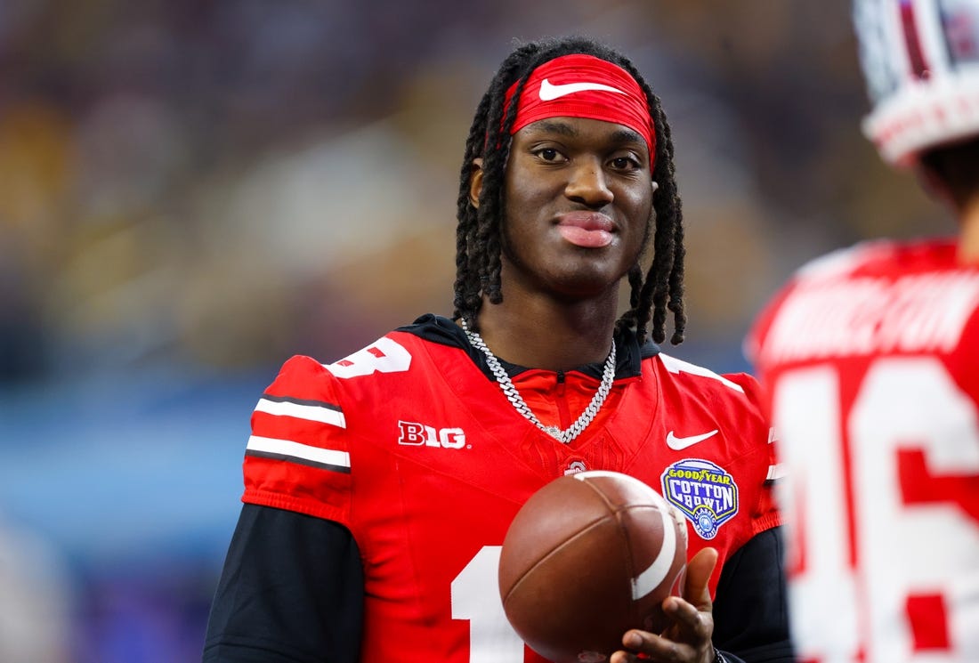 Dec 29, 2023; Arlington, TX, USA;  Ohio State Buckeyes wide receiver Marvin Harrison Jr. (18) looks on during the second half against the Missouri Tigers at AT&T Stadium. Mandatory Credit: Kevin Jairaj-USA TODAY Sports