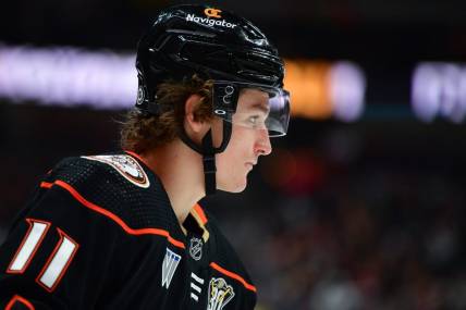 Dec 29, 2023; Anaheim, California, USA; Anaheim Ducks center Trevor Zegras (11) during a stoppage in play in the second period at Honda Center. Mandatory Credit: Gary A. Vasquez-USA TODAY Sports