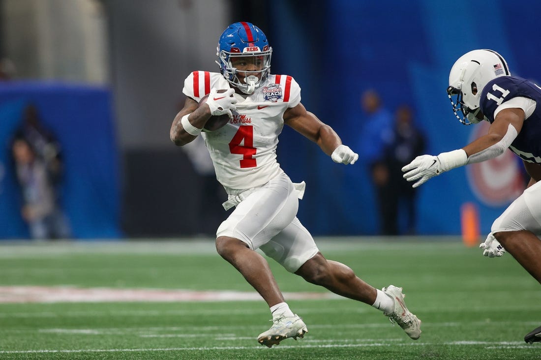 Dec 30, 2023; Atlanta, GA, USA; Mississippi Rebels running back Quinshon Judkins (4) runs the ball against the Penn State Nittany Lions in the first quarter at Mercedes-Benz Stadium. Mandatory Credit: Brett Davis-USA TODAY Sports