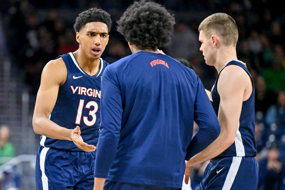 Dec 30, 2023; South Bend, Indiana, USA; Virginia Cavaliers guard Ryan Dunn (13) reacts after a basket in the second half against the Notre Dame Fighting Irish at the Purcell Pavilion. Mandatory Credit: Matt Cashore-USA TODAY Sports