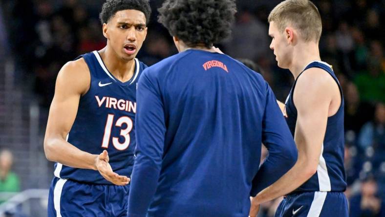 Dec 30, 2023; South Bend, Indiana, USA; Virginia Cavaliers guard Ryan Dunn (13) reacts after a basket in the second half against the Notre Dame Fighting Irish at the Purcell Pavilion. Mandatory Credit: Matt Cashore-USA TODAY Sports