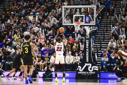 Dec 31, 2022; Salt Lake City, Utah, USA; Miami Heat forward Jimmy Butler (22) takes a free throw shot against the Utah Jazz during the second half at Vivint Arena. Mandatory Credit: Christopher Creveling-USA TODAY Sports